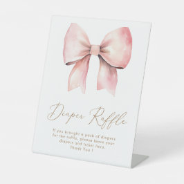 ピンクボウのミニマリスト女の子ベビーシャワーオムツラッフル 台座サイン