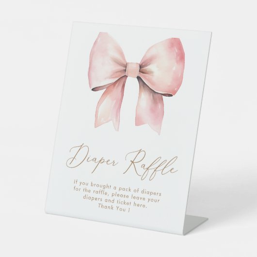 ピンクボウのミニマリスト女の子ベビーシャワーオムツラッフル 台座サイン (正面)