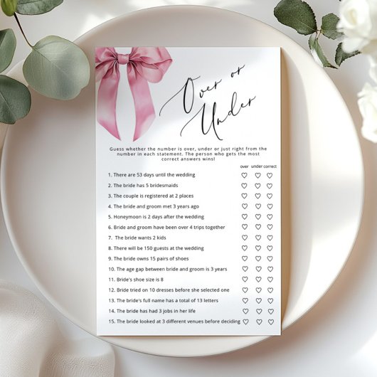 ピンクボウの上または下のブライダルシャワーゲーム