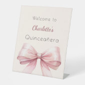 ピンクボウクリームベージュキンセアニェラへようこそ 台座サイン (正面)