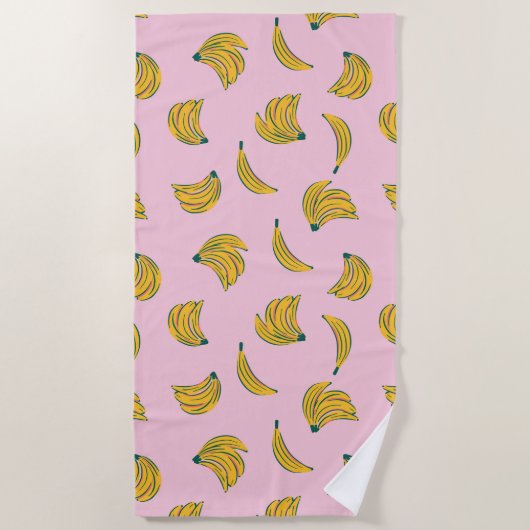 ピンクポップ・アートのの背景に黄色のアートバナナパターン ビーチタオル (正面)
