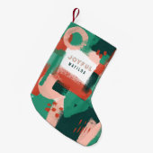 ピンクモダンの抽象的で写実的な赤 + 緑の嬉しい スモールクリスマスストッキング (正面 (吊り時))