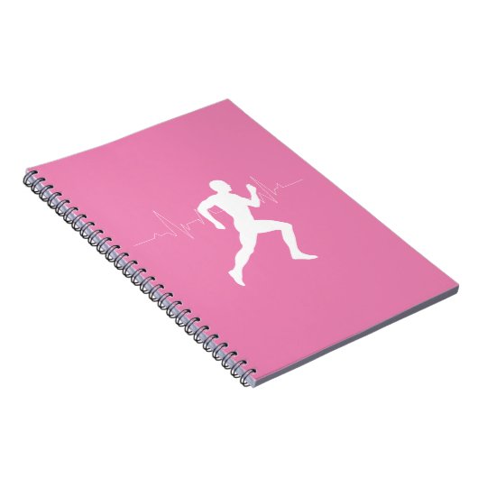 ピンクランニングの背景に男のランナーのシルエット ノートブック (右側)