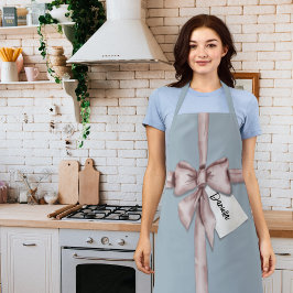 ピンク包まれたの弓で エプロン