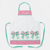 ピンク名門私立校風のとターコイズのフローラ弓パーソナライズされた エプロン (正面)