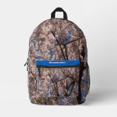 ピンク春フラワーブロッサム傘ブルースカイ プリントバックパック (正面)