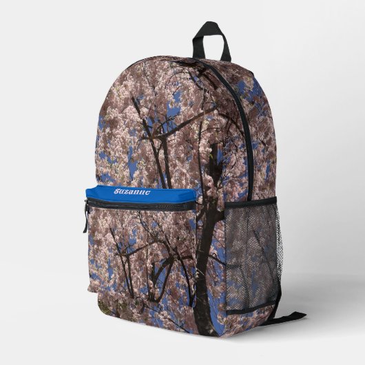 ピンク春フラワーブロッサム傘ブルースカイ プリントバックパック (裏面右端)