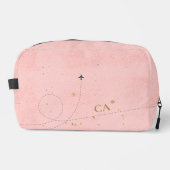 ピンク淡い色のミニマリスト黄金モノグラム飛行機 ドップキット (正面)