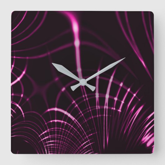 ピンク色と濃い背景の尖った曲線 スクエア壁時計 (正面)