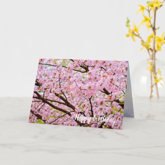 ピンク色のさくらんぼの泡が桜の木々の上に咲く カード (黄色い花)