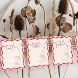 ピンク色のオレンジ色縁どの波型座席名テーブルカード 招待状