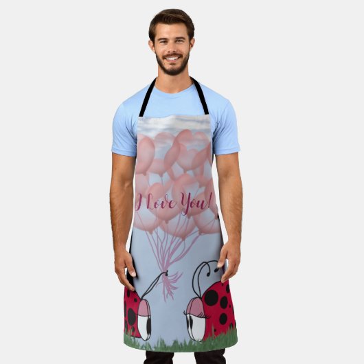 ピンク色のバルーンブーケかわいらしを持つ愛らしいラディバグ エプロン (着用した状態)