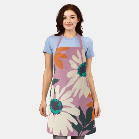 ピンク色のポップ・アートのデイジー芸術的フローラ エプロン (着用した状態)