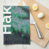 ピンク色のメガネを使ったグリーンライオン「はくな又田」アート キッチンタオル (四つ折り)