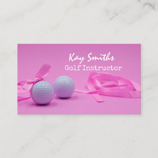 ピンク色のリボンが付いたゴルフボール、ピンクの女性ゴルファー 名刺 (正面)