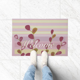 ピンク色の縁取りと薄い緑 ドアマット