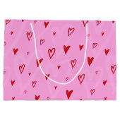 ピンク色の背景に可愛い赤いハート ラージペーパーバッグ (裏面)