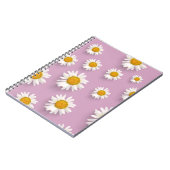 ピンク色の背景に明るいデイジーパターン ノートブック (左側)