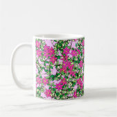 ピンク色の背景に淡い色のファシヤの花 コーヒーマグカップ (左)
