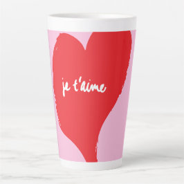 ピンク色の背景にje'aime-文字を持つ赤いハート カフェラテマグ