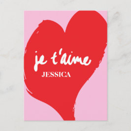 ピンク色の背景にje'aime-文字を持つ赤いハート ポストカード