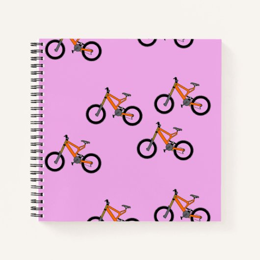 ピンク色の自転車パターン ノートブック (正面)