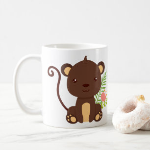 ピンク色の花が咲くかわいい茶色のサル コーヒーマグカップ