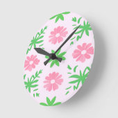 ピンク色の花と緑の離れ花の継ぎ目のないパターン ラウンド壁時計 (傾斜)