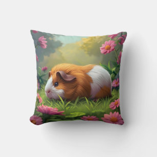 ピンク色の花の中のモルモット クッション