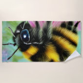 ピンク色の花を咲かせる美しいハチ ビーチタオル (正面)