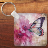 ピンク色の花を持つ夢のような蝶 キーホルダー (正面)