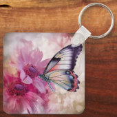 ピンク色の花を持つ夢のような蝶 キーホルダー (裏面)