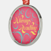 ピンク色の黄色い渦巻き形が常読に本風 メタルオーナメント (左)