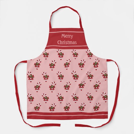 ピンク赤と白にクリスマスキャンディーケーンパターン エプロン (正面)