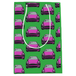 ピンク電気自動車SUVカーグリーン背景 ミディアムペーパーバッグ