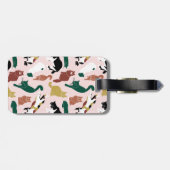 ピンク魅力的色の背景に手書き猫 ラゲッジタグ (裏面横)