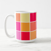 ピンク、オレンジ、黄色の正方形 コーヒーマグカップ (左)