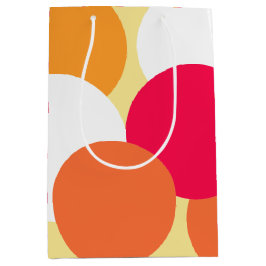 ピンク、オレンジ、黄色の水玉模様 ミディアムペーパーバッグ