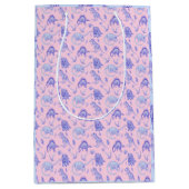 ピンク、薄紫、青、紫の恐竜抱き枕 ミディアムペーパーバッグ (正面)