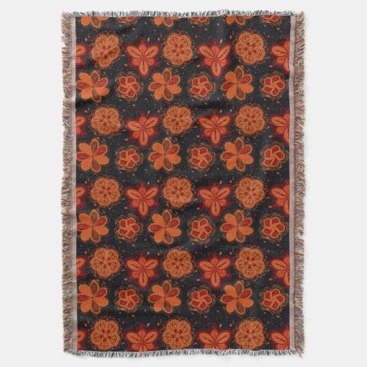 ピーシーなオレンジ色の花の暗いパターン スローブランケット (正面縦)
