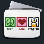 ピースラブペンギンズ ラップトップスリーブ<br><div class="desc">緑の平和サインと赤いハートとかわいいペンギン。私は動物の贈かわいらしり物が大好きです。</div>