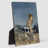 ピーターは彼のフルートを演奏しました フォトプラーク (側面)