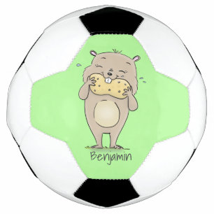 ピーナッツの漫画と可愛い幸せな笑顔のハムスター サッカーボール
