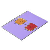 ピーナッツバターおよびゼリーの握りこぶしは友人のトーストをぶつけます ノートブック (左側)