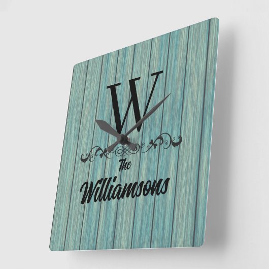 ファミリ名モノグラム素朴ブルーウッドウォールクロック スクエア壁時計 (傾斜)