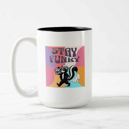 ファンキーなスカンクでいろ ツートーンマグカップ (左)
