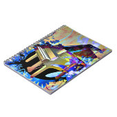 ファンキーなデジタルによって着色されるピアノ ノートブック (左側)