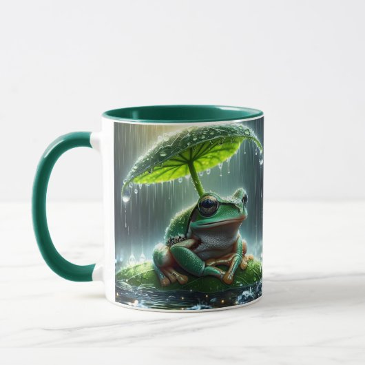 ファンタジーかわいいカエルの葉傘 マグカップ (左)