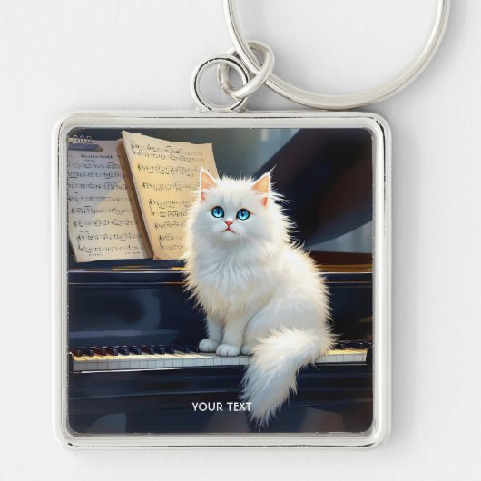 ファンタジーかわいいラグドール猫オンピアノ キーホルダー (正面)