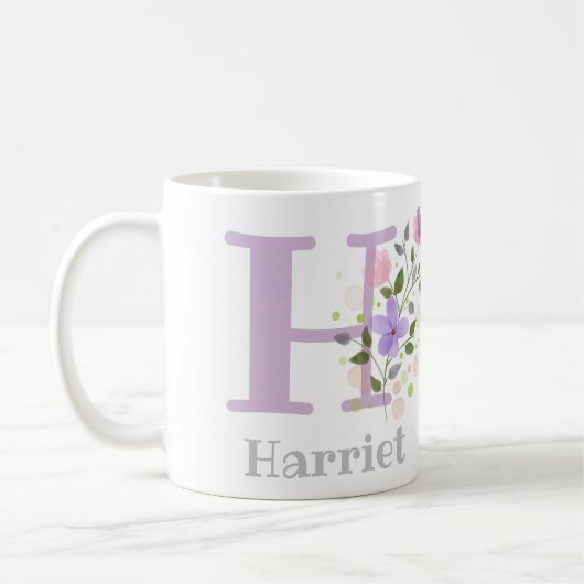 ファーストイニシャルプラス花の付いたHarriet コーヒーマグカップ (左)